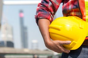 Man holding his hard hat